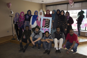 PHOTO BY MIRANDA SCHMIDT The members from the Muslim Student Association pause for a photo as the culturally expanding chaos of Hijab day continues around them.